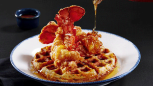 Fried Lobster Tails with Sweet Corn Waffles and Spicy Maple Syrup